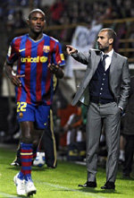 Josep Guardiola y Éric Abidal
