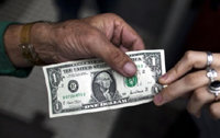 Argentina prohíbe oficialmente la compra de dólares