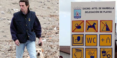El expresidente José María Aznar pasea con su perro por una zona prohibida para animales. Foto: GTRES