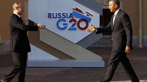 Vladimir Putin, presidente ruso, saluda a Barack Obama, presidente de los EEUU a su llegada a la cumbre.