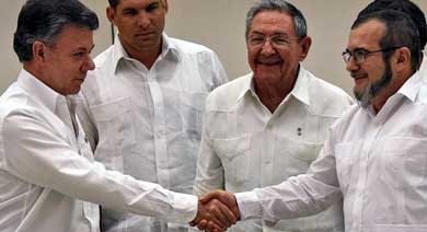 Santos y las FARC prometen firmar la paz en seis meses tras sellar un pacto sobre justicia