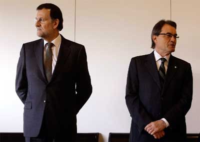 Rajoy y Mas, dos hombres en el tiempo...