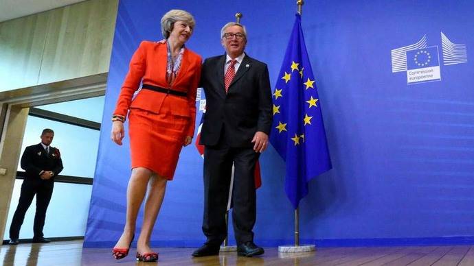 May dice a la UE que Reino Unido controlará migración