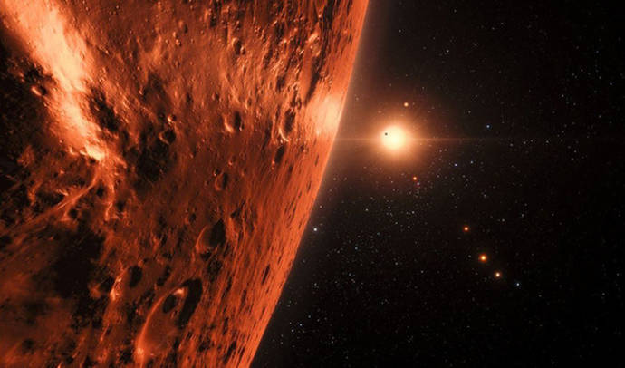 Ilustración de la estrella enana TRAPPIST-1 y sus siete planetas vistos desde uno de ellos