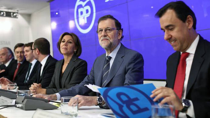 El presidente del Gobierno, Mariano Rajoy, junto a Dolores de Cospedal y Fernando Martínez Maillo