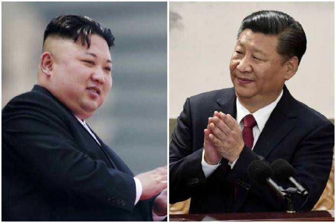Kim Jong-un, líder norcoreano (i)  y Xi Jinping Presidente de China