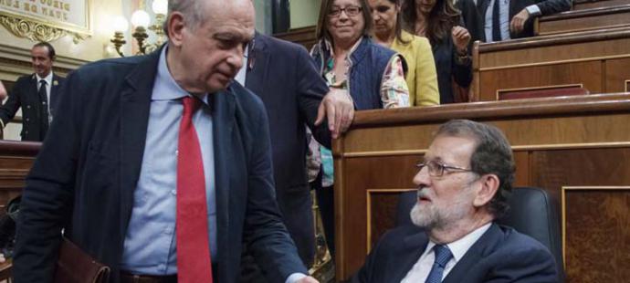 Fernández Díaz (i) y Rajoy