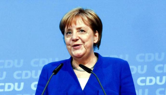 Angela Merkel logró un acuerdo para poner fin a la disputa por inmigración en la coalición de gobierno.