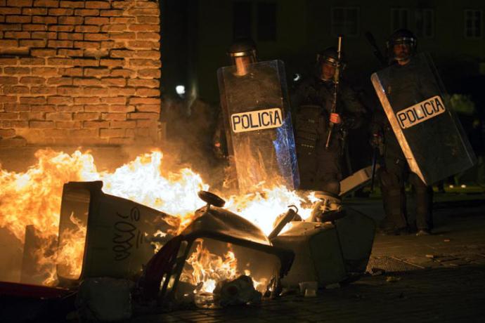 Violentos disturbios en Madrid por la muerte de un vendedor ambulante