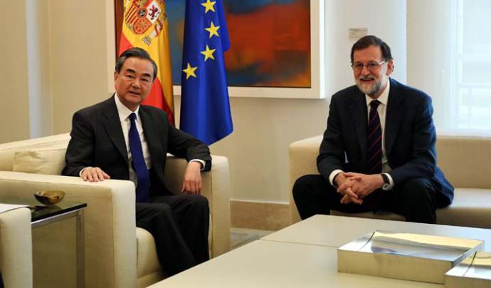 Wang Yi y Mariano Rajoy