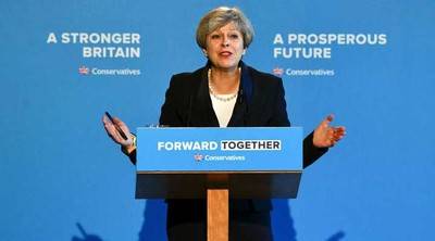 May reitera su promesa de reducir la inmigración en el Reino Unido
