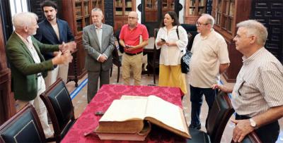 Acto de entrega del libro mayor de Carlos Larios (1875) a la sociedad económica