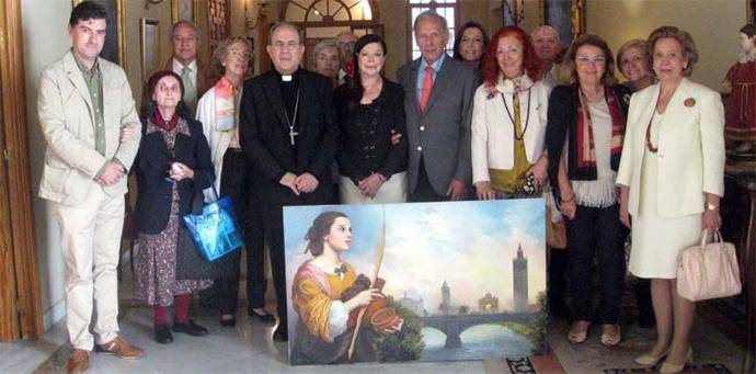 Trinidad Romero entrega el cuadro “Santa Justa y Sevilla” al arzobispado de Sevilla
