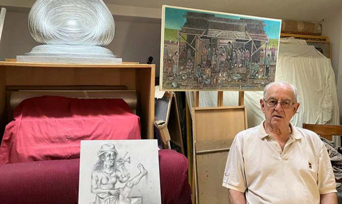 El pinto en su estudio