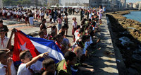 Niños cubanos, en un homenaje en Cuba a Camilo Cienfuegos, uno de los héroes históricos de la revolución cubana. 

