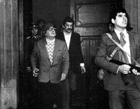 En la imagen de archivo, la última foto de Allende con su guardia personal el 11 de septiembre de 1973